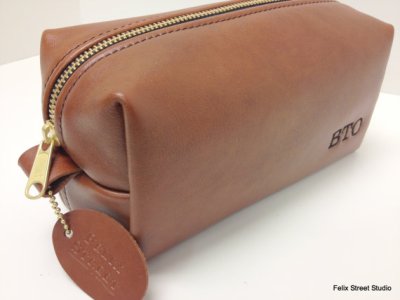 This make-up/whiskey/miscellaneous leather bag is nice... 